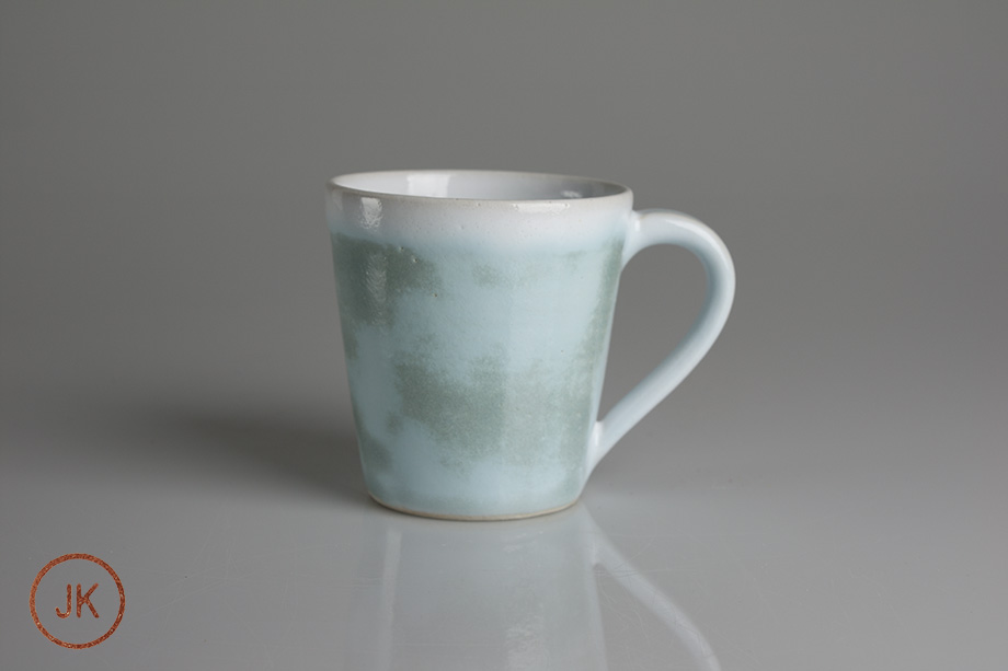 Kopp grön engob och pussvit